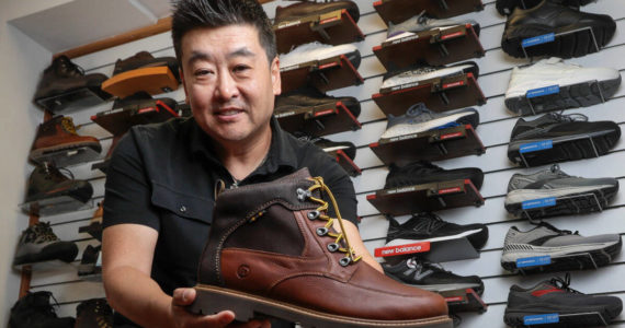 Wide Shoes Only store owner Dominic Ahn offers more than 600 styles of shoes for people with wide feet. His parents started the first store 42 years ago. The stores are in Edmonds and Renton. (Kevin Clark / The Herald)