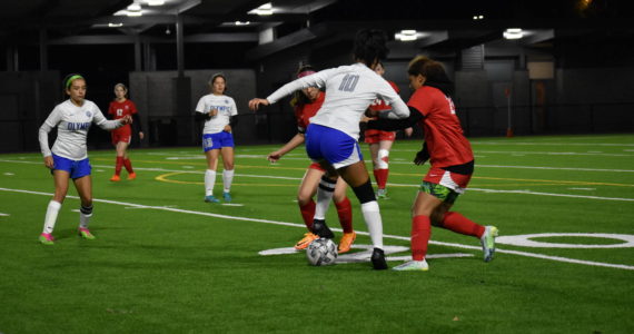 Ben Ray/Sound Publishing
Renton and Olympic battle for possession late in the second half of their opening round district playoff game.