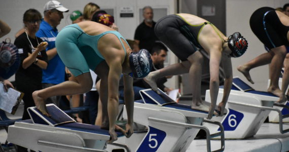 Lindbergh senior Caelee Truong preparing for her 50-yard freestyle race. Ben Ray/Sound Publishing