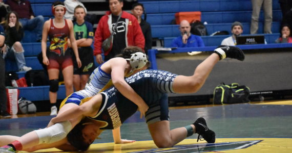 Photo by Ben Ray
Lindbergh Jr. Jasmin Cruz-Abarca is in a precarious situation on the way to her win on Tuesday, Dec. 6.