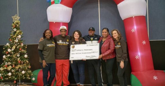 The UPS Foundation Esther Ndichu, Black Equality Coalition Anthony Curtis, UPS Community Relations Kate Kane, Community Passageways Dominque Davis and Andrea Altheimer, and UPS’s Chief Corporate Affairs and Sustainability Officer Laura Lane. Photo courtesy of Black Equality Coalition.