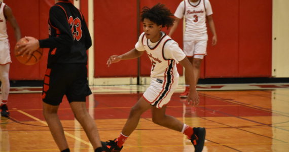 Renton sophomore Jordan Agosto locking down the Sammamish point guard. Ben Ray/ Renton Reporter