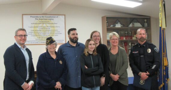 From left: Mayor Pavone, Post Commander Patty Reese, Eric Maestas, daughter Emaline, wife Brianna, Lora Ueland of Valley Communications and Officer Johnson. Courtesy photo