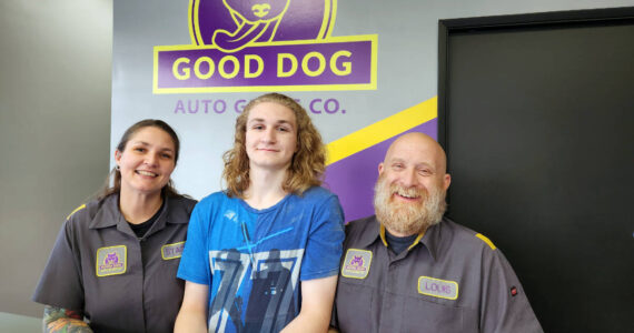 Stacy Bruski (left) and Louis Bruski (right) with son Bendid Bruski (center), owners of Good Dog Auto Glass.