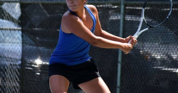 Tayler Conway looks to rip a backhand down the court at Lower Woodland Park. Ben Ray / The Reporter