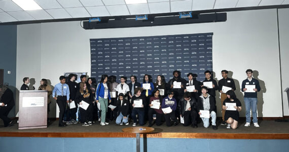 All of the honored students getting together for a photo. Photo by Joshua Solorzano/The Reporter