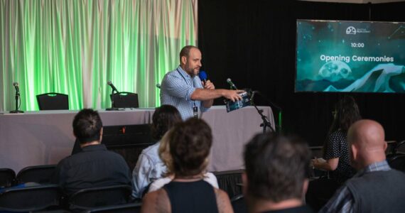 Ben Andrews speaking at The Summit 2022. Photo Courtesy of Ben Andrews