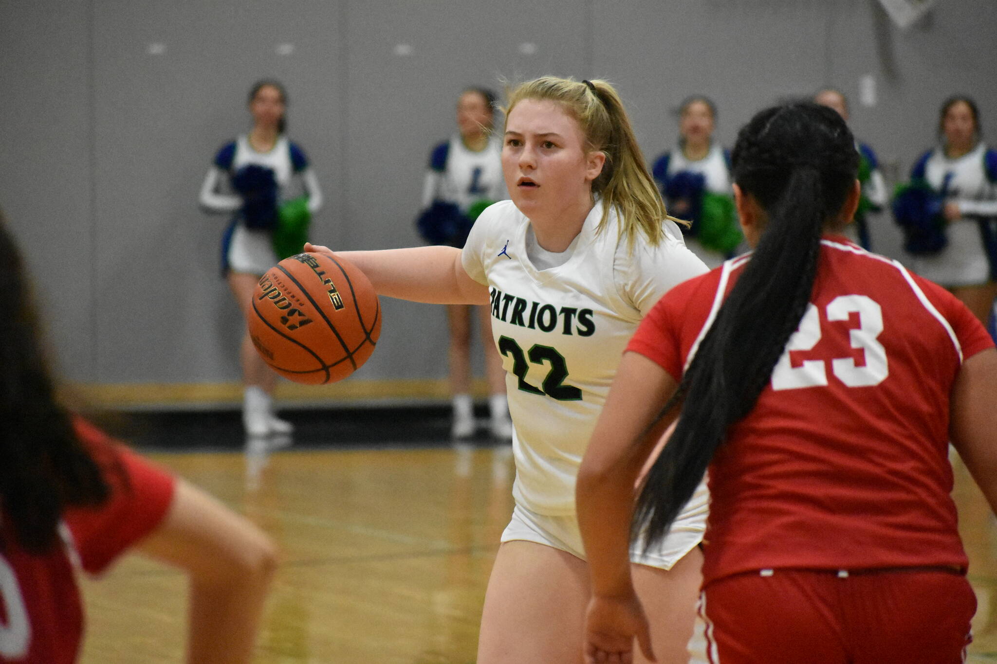 Ella Whitaker sizes up her opponent while running the Liberty offense. Ben Ray / The Reporter