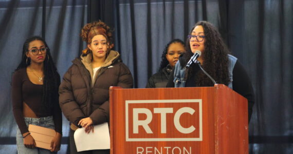 Kirsten Thornton (right) speaks at the Black History Month forum about the Renton School District’s upcoming HBCU Delegation and Tour. Students who part of previous HBCU tours also spoke about their experiences. Photo by Bailey Jo Josie/Sound Publishing.