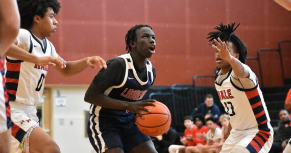 Lindbergh senior John Choul is surrounded by Nathan Hale defenders. Ben Ray / The Reporter