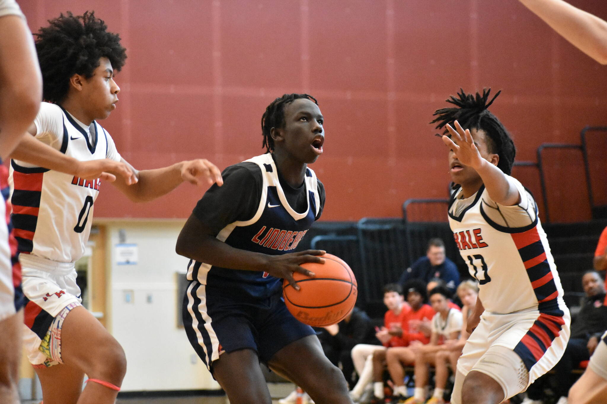 Lindbergh senior John Choul is surrounded by Nathan Hale defenders. Ben Ray / The Reporter
