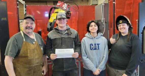 The Renton Promise initiative allowed Mason Nelson (center left) and Vanessa Garcia (center right) to enroll in RTC’s Welding Program in 2024. Nelson and Garcia are pictured with welding instructors Rick Geist (left) and Elisa Westcrook (right). Photo courtesy of Renton Technical College