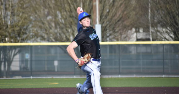 Ryan Boehm delivers a pitch against the Kentridge Chargers. Ben Ray / The Reporter
