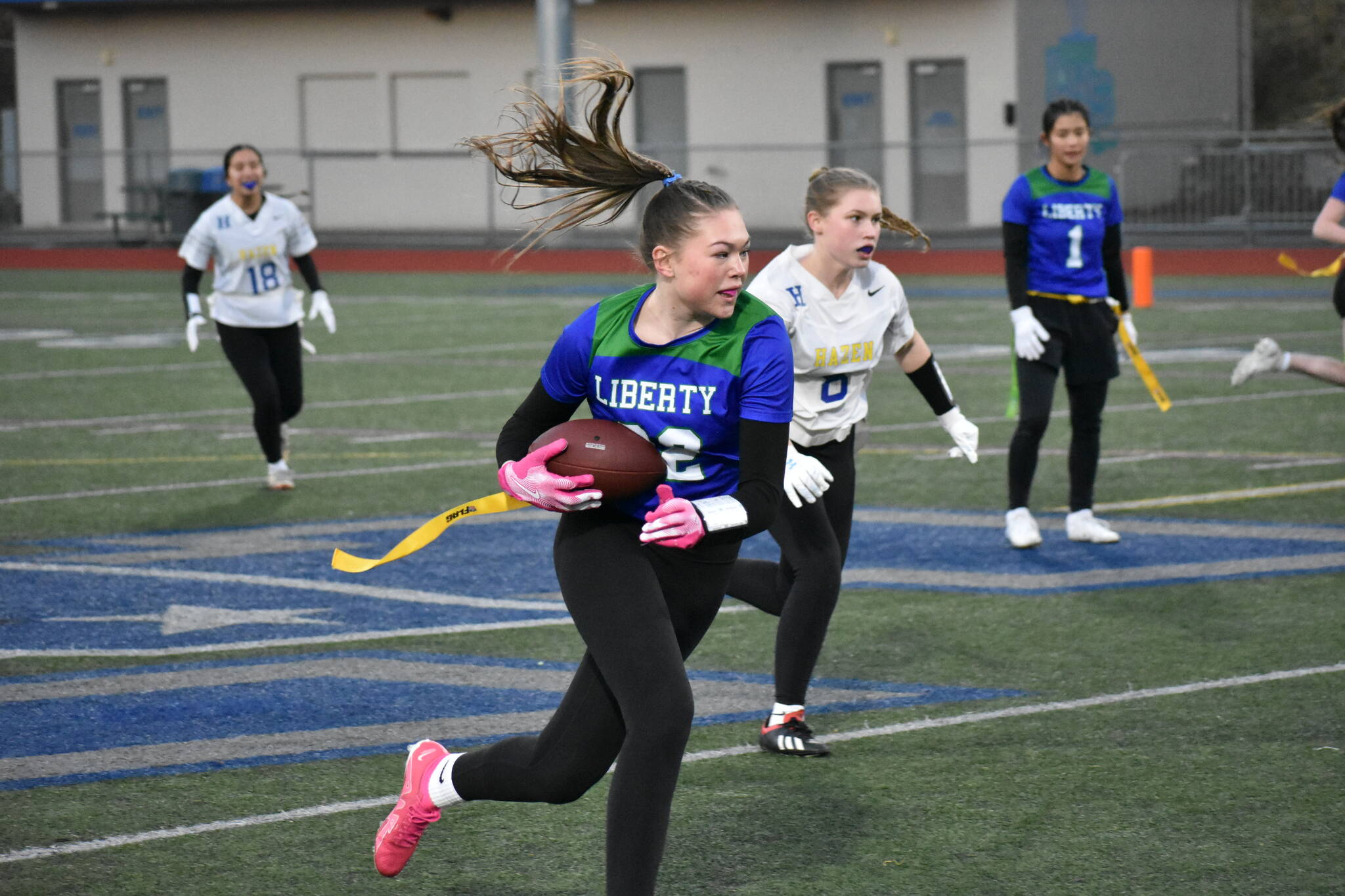 Ben Ray / The Reporter 
Alison Frank makes a catch and runs the ball upfield for Liberty High School.