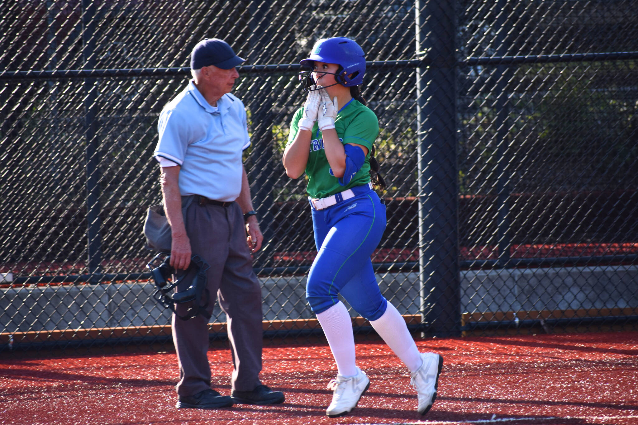Emi Connell approaches home plate with a smile. Ben Ray / The Reporter
