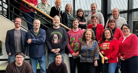 A group photo from Dec. 2024 of Sound Publishing’s King County news team that produces local newspapers including the Renton Reporter. File photo
