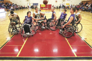 The Seattle Junior Sonics play the Minnesota Royals in the National Wheelchair Basketball Association’s Varsity National Championships