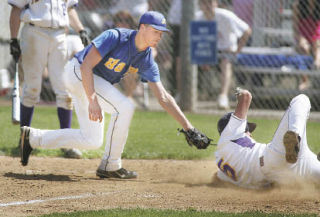 Hazen relief pitcher Derek Cline can’t get the tag on Issaquah’s Andy Salmeri